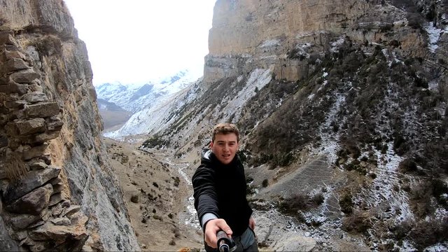Selfie in a narrow rocky mountain canyon