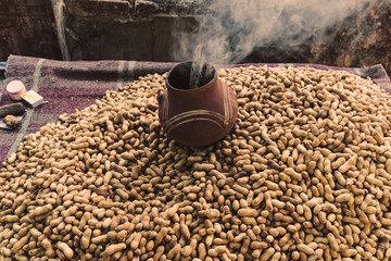Pile of raw peanuts on a street market in India © diy13