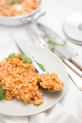 rice with fish and seafood on plate