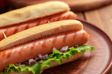 Hot dogs on wooden background