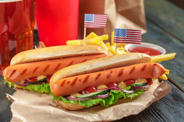 Hot dogs on wooden background