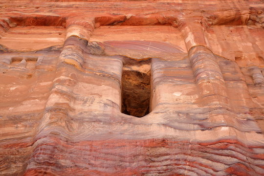 Close-up on the Silk Tomb with colorful sandstone in Petra, Jordan, Middle East. In Petra rock tombs were carved into the sandstone in the 3rd century BC.