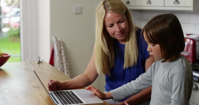 Mother and daughter on a laptop
