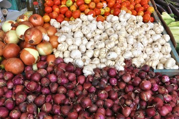Onions and garlic at a market