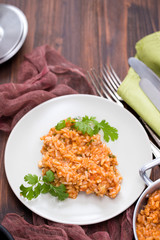 rice with fish and seafood on plate