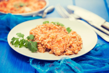 rice with fish and seafood on plate