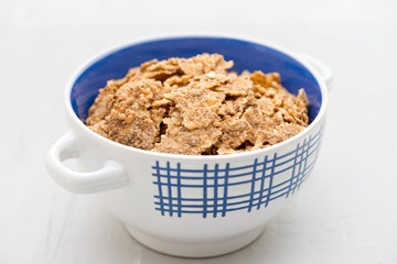 cereals in white blue bowl