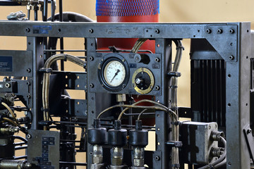 Hydraulics oil station on the machine tool on industrial equipment. Lubrication system with oil...