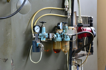 Hydraulics oil station on the machine tool on industrial equipment. Lubrication system with oil...