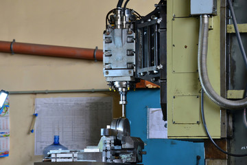 Hydraulics oil station on the machine tool on industrial equipment. Lubrication system with oil under pressure.