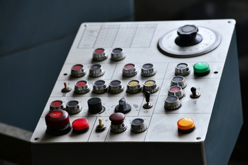 Industrial remote control of machinery with different buttons.