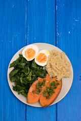 sweet potato with quinoa, boiled egg on plate