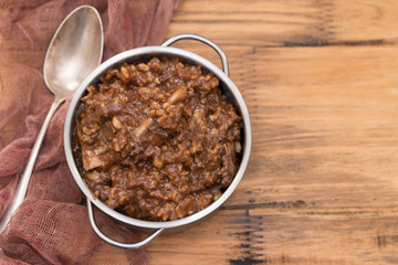 rice with rabbit on dish on wooden background