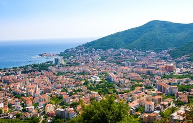 Fototapeta na wymiar Top view of the town of Budva with high mountains. Montenegro