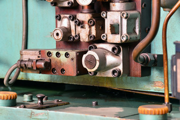 Hydraulics oil station on the machine tool on industrial equipment. Lubrication system with oil under pressure.