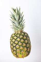 Fototapeta premium Pineapple at bright background, close up