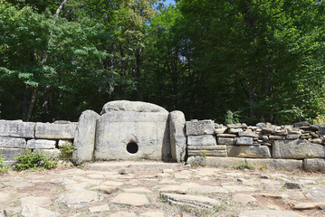 Mysterious dolmen in the valley of the river Zhane in the mountains of Gelendzhik. Dolmen in the mountains of Gelendzhik