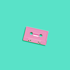Obraz premium Pastel retro realistic cassette on flat background, vector illustration