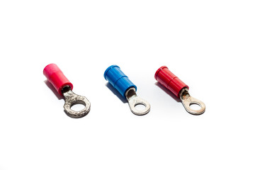 Electrical red and blue Ring Terminal on white background.