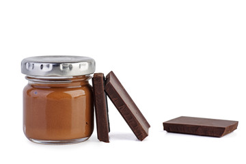 Glass jar with chocolate spred and three pieces