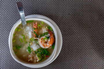 Shrimp porridge in the bowl on table