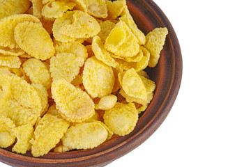 Ceramic bowl filled with corn flakes