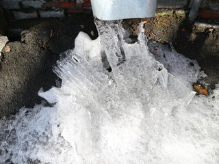ice under a drainpipe