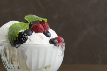 Ice cream balls in a glass vase.