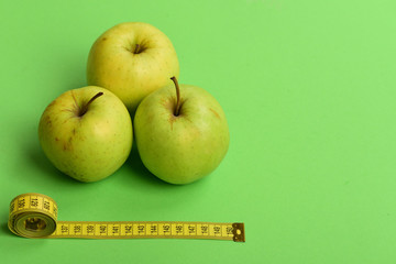 Athletics and weight loss concept. Pattern made of apple fruits