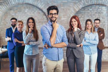 Fototapeta premium Group of happy business people and company staff in modern office