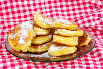 Cottage cheese pancakes on the glass plate
