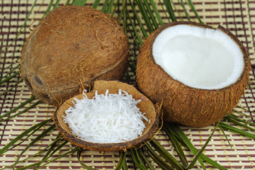 Whole coconut, grated and half
