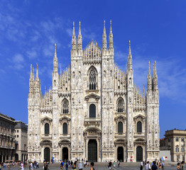 Fototapeta na wymiar Italy, Milan - Exterior view of the Cathedral of St. Mary Nascente - Duomo Santa Maria Nascente di Milano at Piazza del Duomo - Cathedral Square