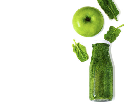 Colorful Green Smoothie In Bottle Isolated On White Background, Top View. Natural Organic Food Style.