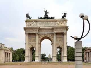 Obraz premium Italy, Milan historic quarter - Arch of the Peace at the Piazza Sempione square near the Castello Sforzesco castle