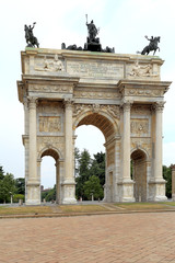 Fototapeta na wymiar Italy, Milan historic quarter - Arch of the Peace at the Piazza Sempione square near the Castello Sforzesco castle