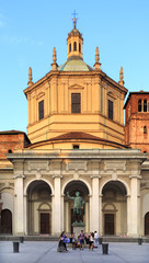 Fototapeta na wymiar Milan, Italy - Exterior view of Basilica of San Lorenzo and the statue of Constantin by the Corso di Porta Ticinese