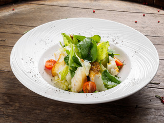Salad with smoked cod.