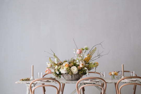 Table setting against gray wall