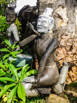 Bangkok, Thailand - Circa January 2018: Statue depicting a Reusi Dat Ton (Thai Yoga) pose at famous Wat Pho (Buddhist Temple)