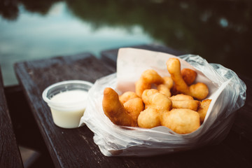 Deep fried Doughsticks with condensed milk.