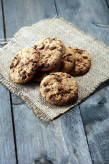 Chocolate cookies on wooden table. Chocolate chip cookies