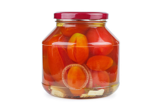 Glass jar with pickled home-made tomatoes