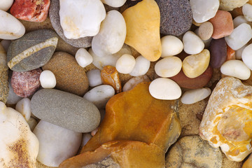 Sea pebbles of different colors and shape