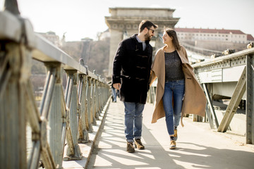 Loving couple on Chain bridge, Budapest