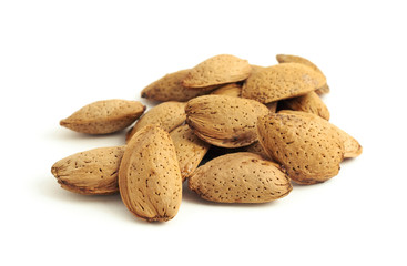 Fresh, healthy almonds on a white background