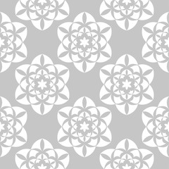 White flowers on gray background. Ornamental seamless pattern