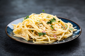 Spaghetti carbonara with egg and pancetta