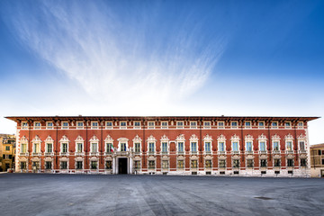 Fototapeta na wymiar Massa. Palazzo Ducale (Ducal Palace). Overlooking Piazza Aranci, it occupies an entire side. It was also called Palazzo Rosso (Red Palace). Massa - Carrara, Tuscany, Italy.