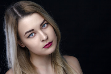 Fototapeta premium beauty, make up and people concept - happy laughing young woman with red lipstick